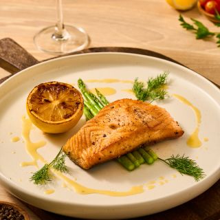 Roasted Salmon, Asparagus & Beurre Blanc at our Thai restaurant in Phuket